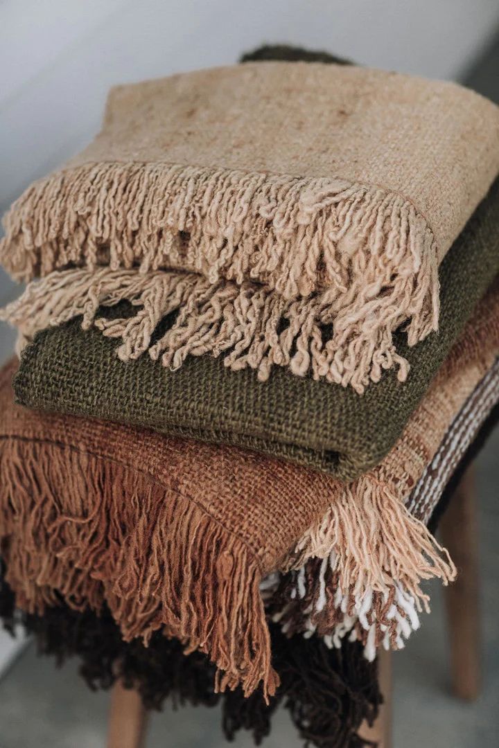 Layered home textiles styled for everyday comfort